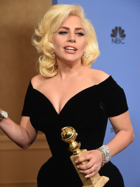 Lady Gaga poses with award for Best Actress TV Series or Limited Movie for her role in American Horror Story Hotel in...